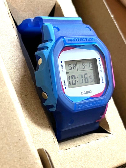 Casio G-Shock DWE-5600PR-2JR Overprint Square Watch Blue Pink Resin New Unused