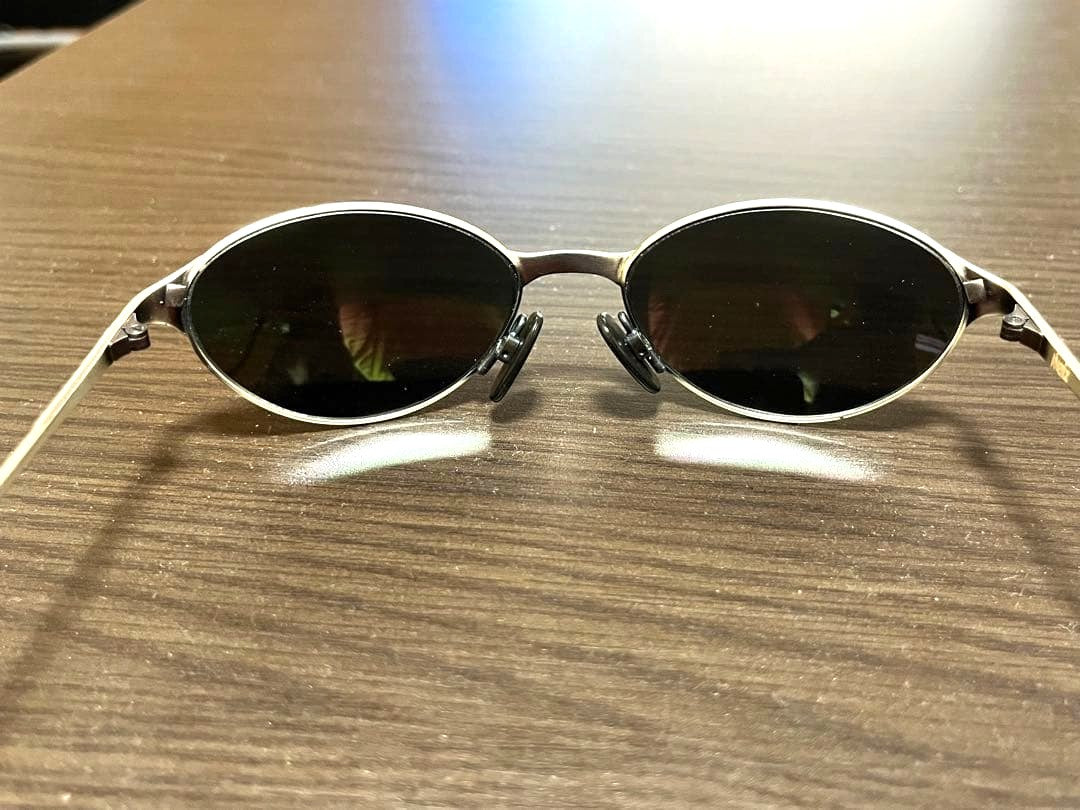 ARNETTE Vintage Round Sunglasses Silver Metal Frame Oval Lens Case Rare Logo