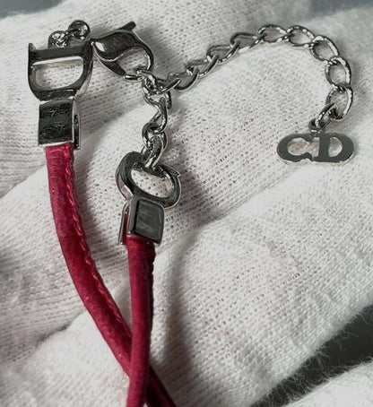 Christian Dior CD Logo Charm Leather Bow Bracelet Pink Silver Tone 6.7-8.7in