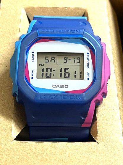 Casio G-Shock DWE-5600PR-2JR Overprint Square Watch Blue Pink Resin New Unused