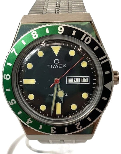 Timex Q Timex 1979 Reissue Quartz Watch Black Dial Green Black Bezel Steel Used