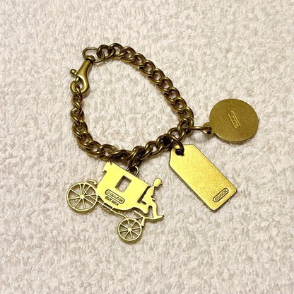 COACH Horse & Carriage Bag Charm Keychain Gold Tone Brass Chain Bracelet Style