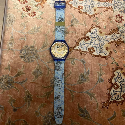 SWATCH Automatic Skeleton Watch Blue Clear Case World Map Strap Gold Dial New