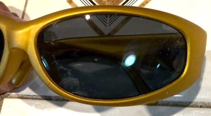 ARNETTE Vintage Gold Oval Sunglasses Matte Gold Frame Dark Lens Hawaii 1990s