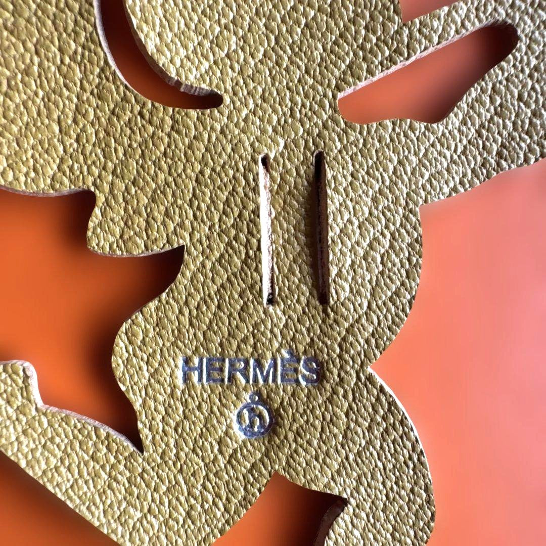 HERMES Cupid Charm Leather Cut-Out Motif Gold Color Angel Bow Arrow Accessory