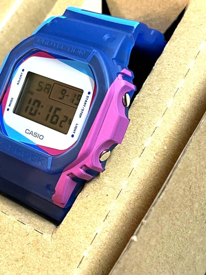 Casio G-Shock DWE-5600PR-2JR Overprint Square Watch Blue Pink Resin New Unused