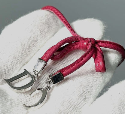 Christian Dior CD Logo Charm Leather Bow Bracelet Pink Silver Tone 6.7-8.7in