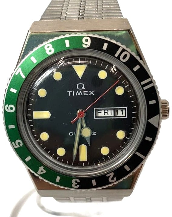 Timex Q Timex 1979 Reissue Quartz Watch Black Dial Green Black Bezel Steel Used