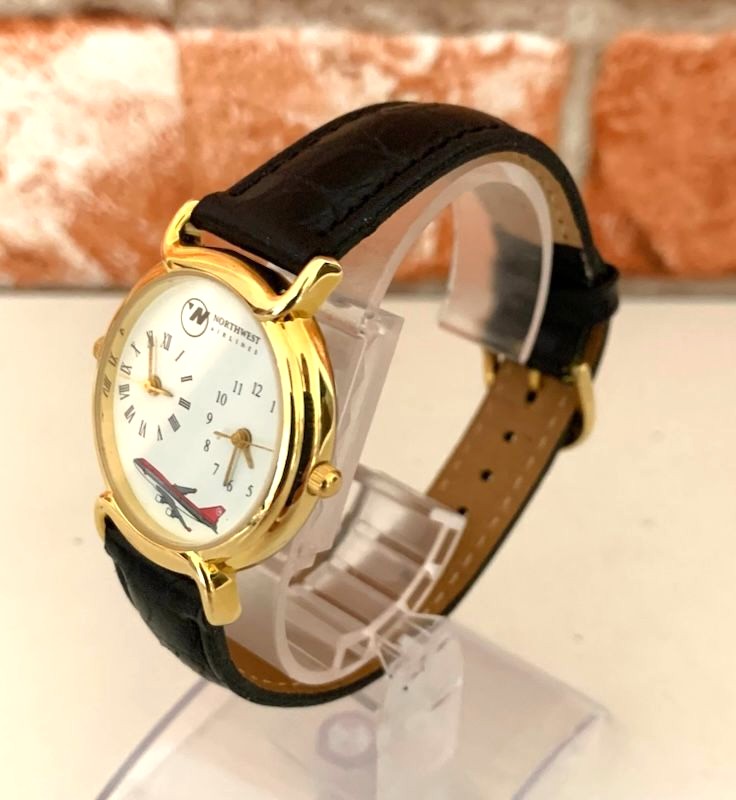 Northwest Airlines Commemorative Quartz Watch Gold Black Airplane Dial Mens Used