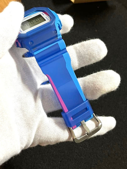 Casio G-Shock DWE-5600PR-2JR Overprint Square Watch Blue Pink Resin New Unused
