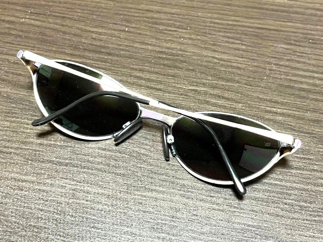 ARNETTE Vintage Round Sunglasses Silver Metal Frame Oval Lens Case Rare Logo
