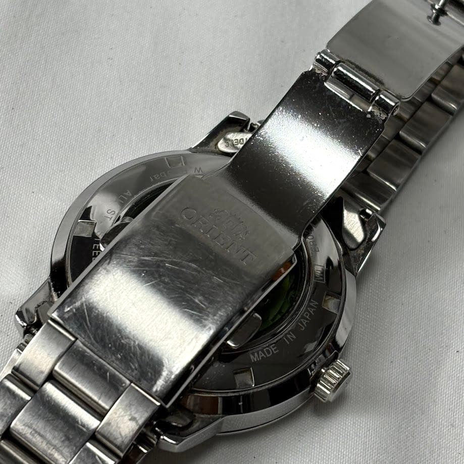 ORIENT Rainbow Disk Automatic Watch Black Dial Date Skeleton Caseback Steel