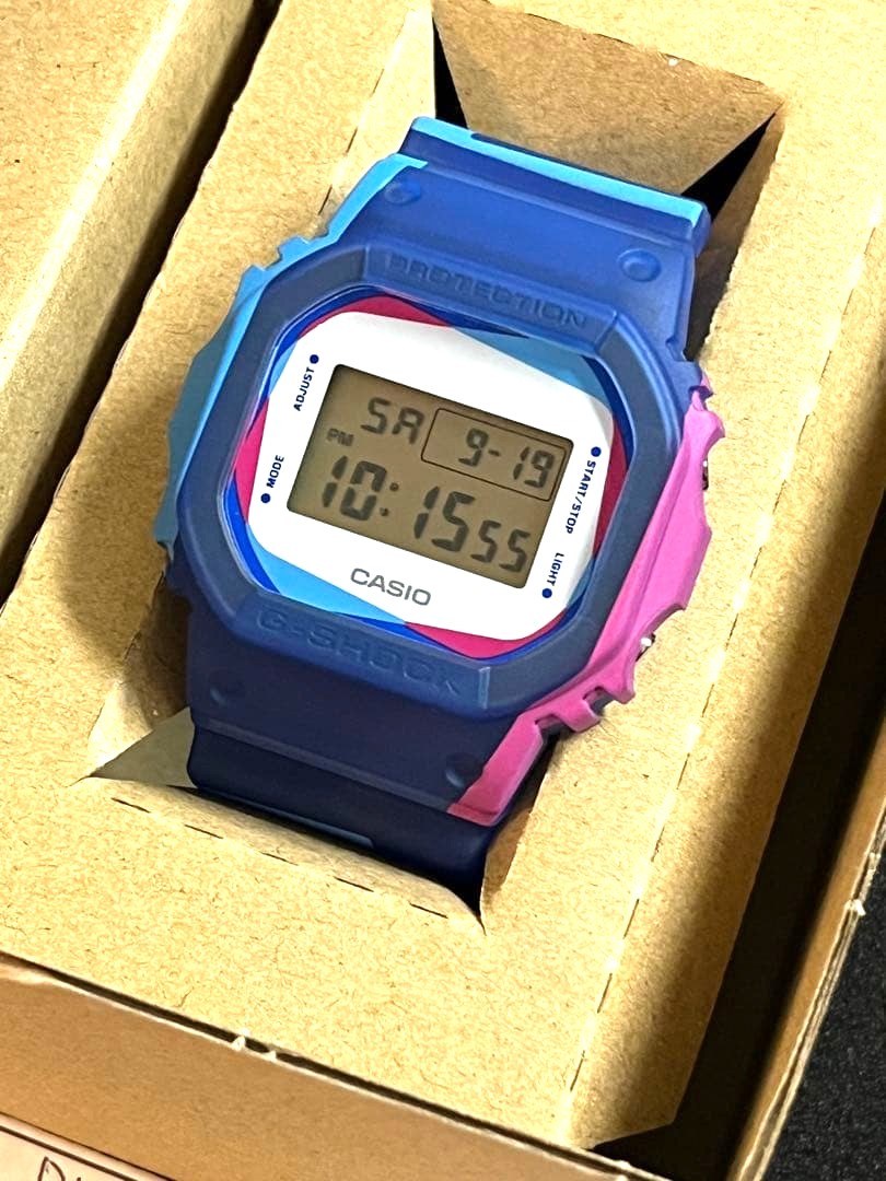 Casio G-Shock DWE-5600PR-2JR Overprint Square Watch Blue Pink Resin New Unused