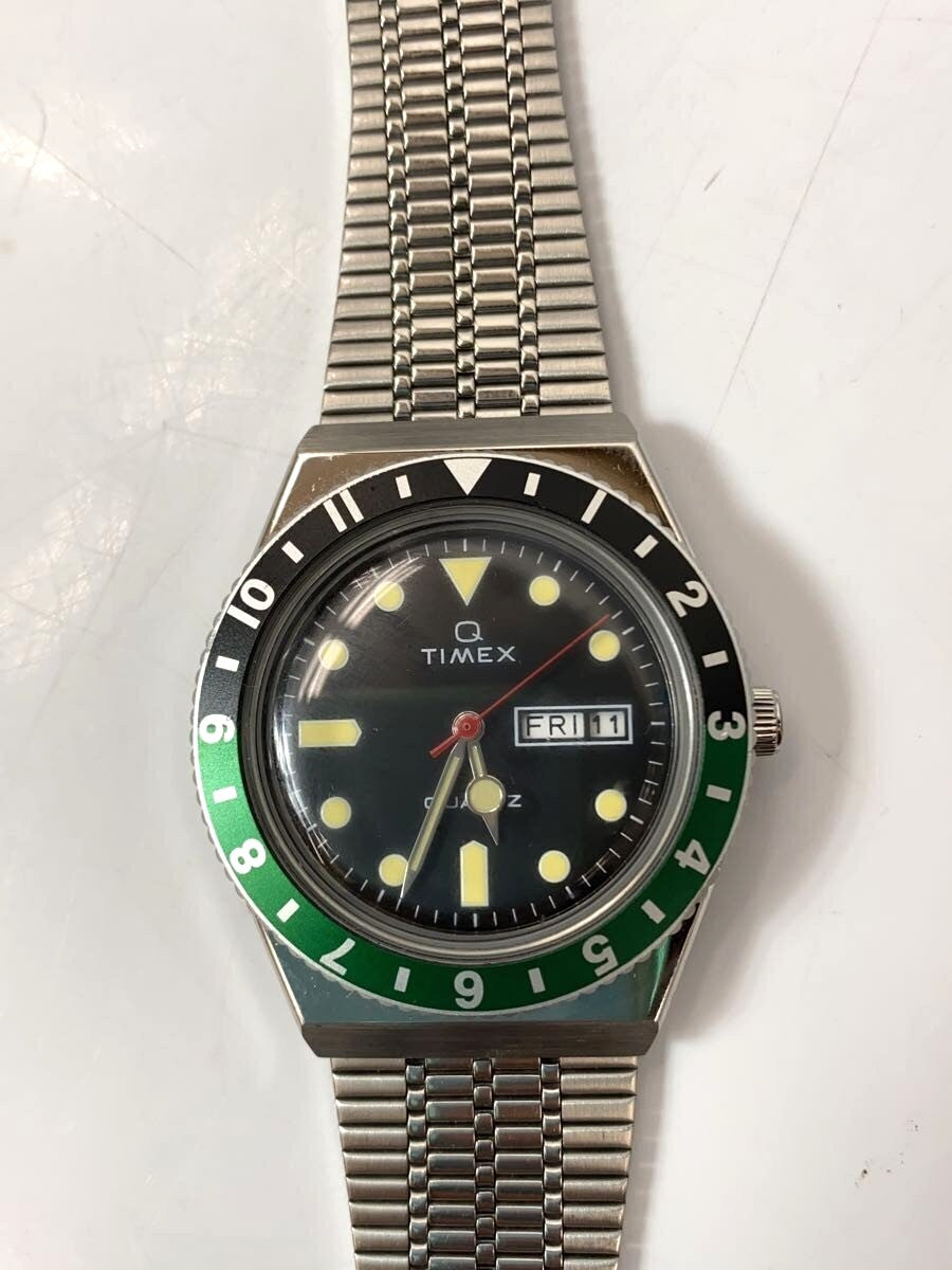 Timex Q Timex 1979 Reissue Quartz Watch Black Dial Green Black Bezel Steel Used