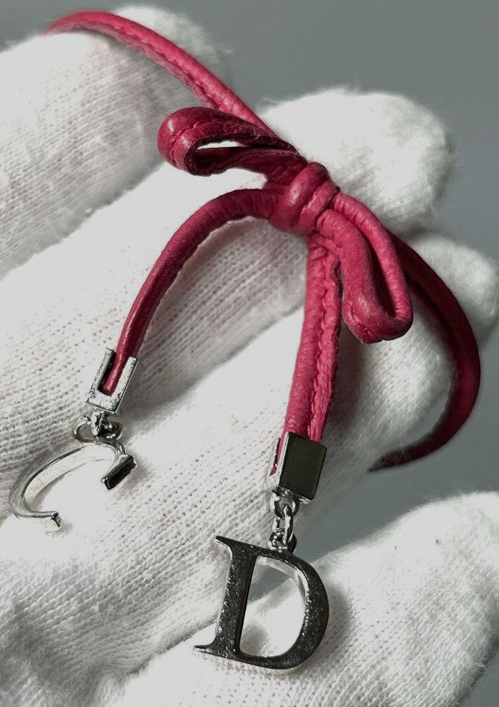 Christian Dior CD Logo Charm Leather Bow Bracelet Pink Silver Tone 6.7-8.7in