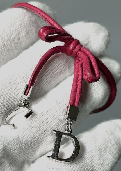 Christian Dior CD Logo Charm Leather Bow Bracelet Pink Silver Tone 6.7-8.7in