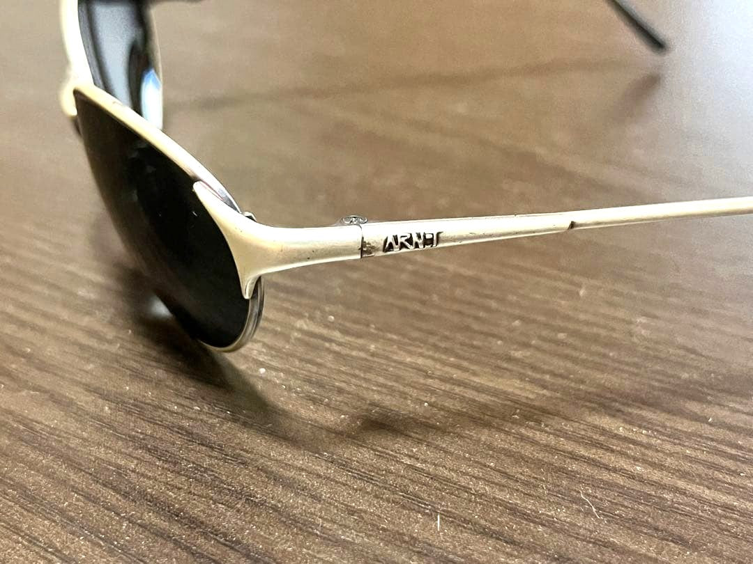 ARNETTE Vintage Round Sunglasses Silver Metal Frame Oval Lens Case Rare Logo