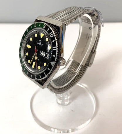 Timex Q Timex 1979 Reissue Quartz Watch Black Dial Green Black Bezel Steel Used