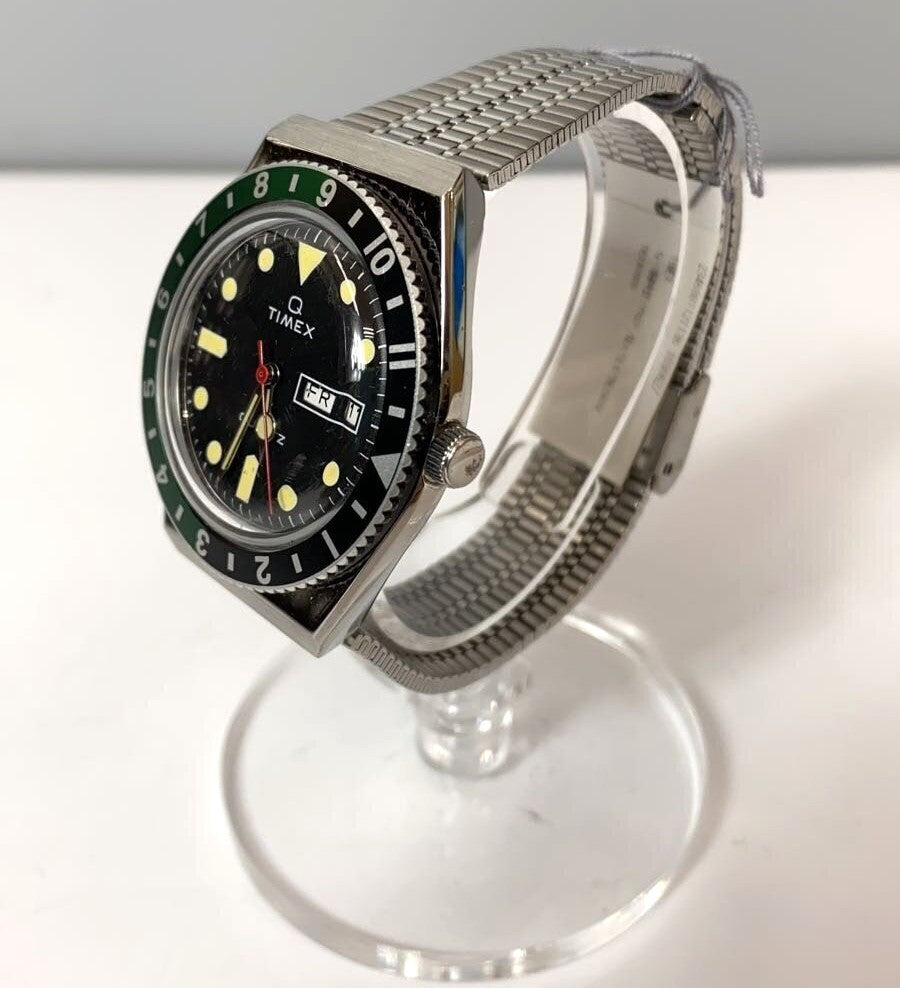 Timex Q Timex 1979 Reissue Quartz Watch Black Dial Green Black Bezel Steel Used